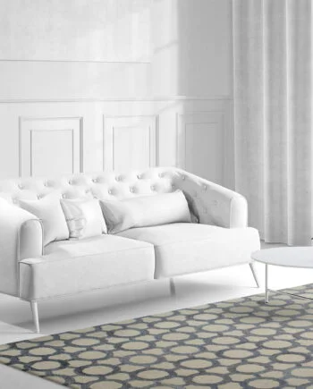 a living room filled with furniture and a large window