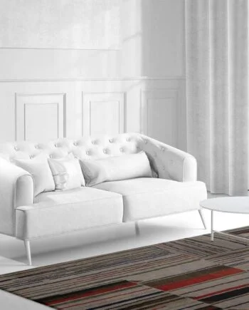 a living room filled with furniture and a large window
