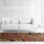 a bedroom with a bed in a room