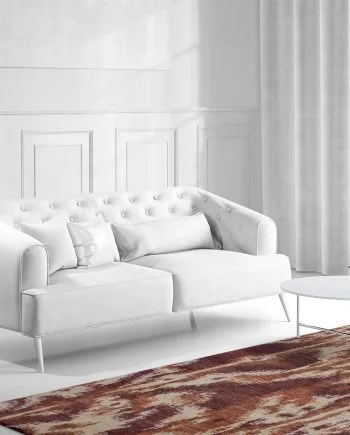 a living room filled with furniture and a large window