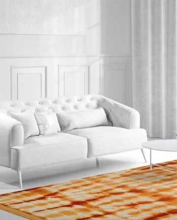 a living room filled with furniture and a large window