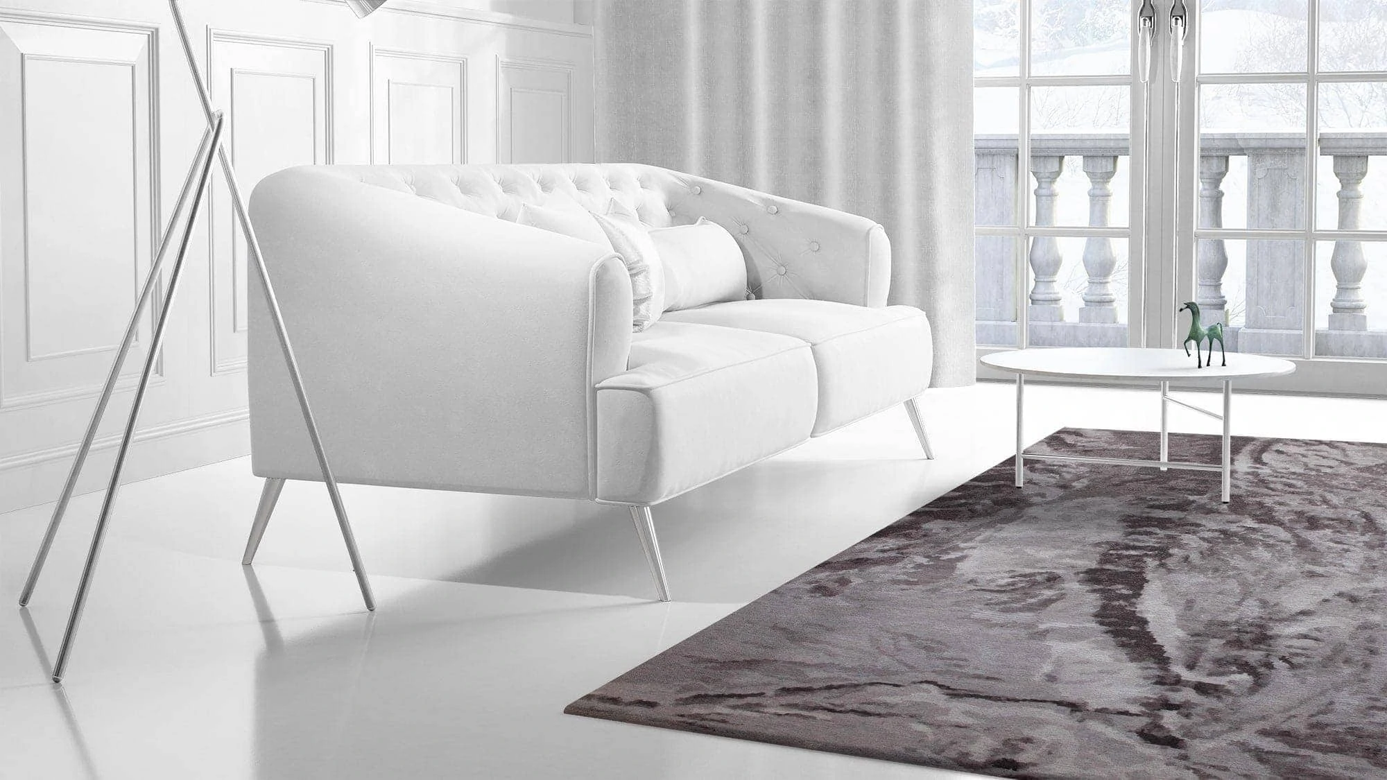 a living room filled with furniture and a large window