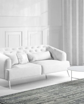 a living room filled with furniture and a large window