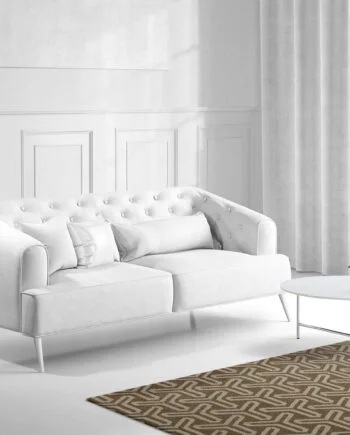 a living room filled with furniture and a large window