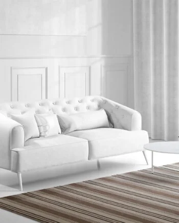 a living room filled with furniture and a large window