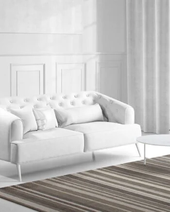 a living room filled with furniture and a large window