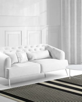 a living room filled with furniture and a large window