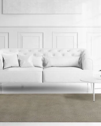 a bedroom with a bed in a room