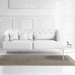 a living room with a couch and a table