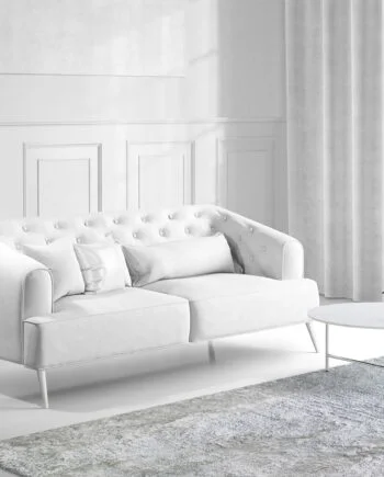a living room filled with furniture and a large window