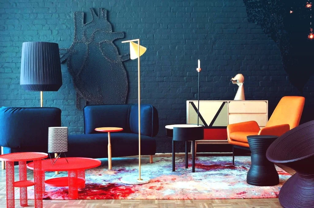 Blue couch and table on a modern rug