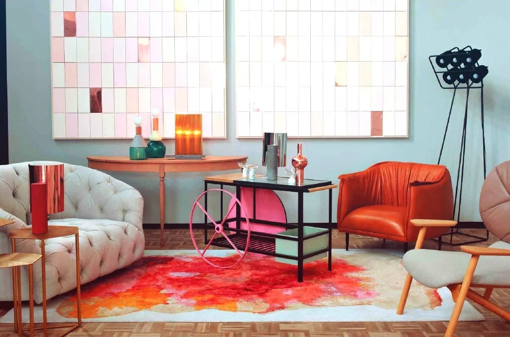 a living room filled with furniture and a rug