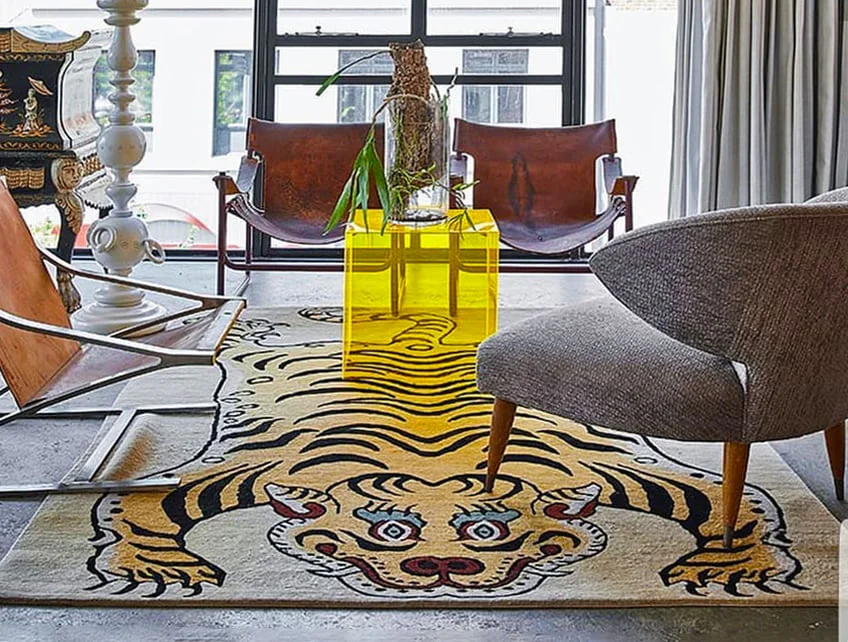 a chair sitting in front of a window